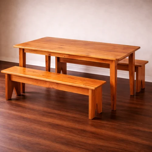custom solid wood dining table with matching benches handcrafted from reclaimed lumber on dark hardwood floors
