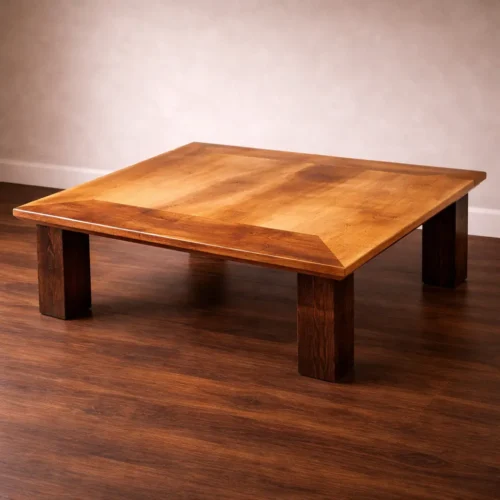 handcrafted reclaimed wood coffee table with thick legs and natural grain detail in outdoor setting
